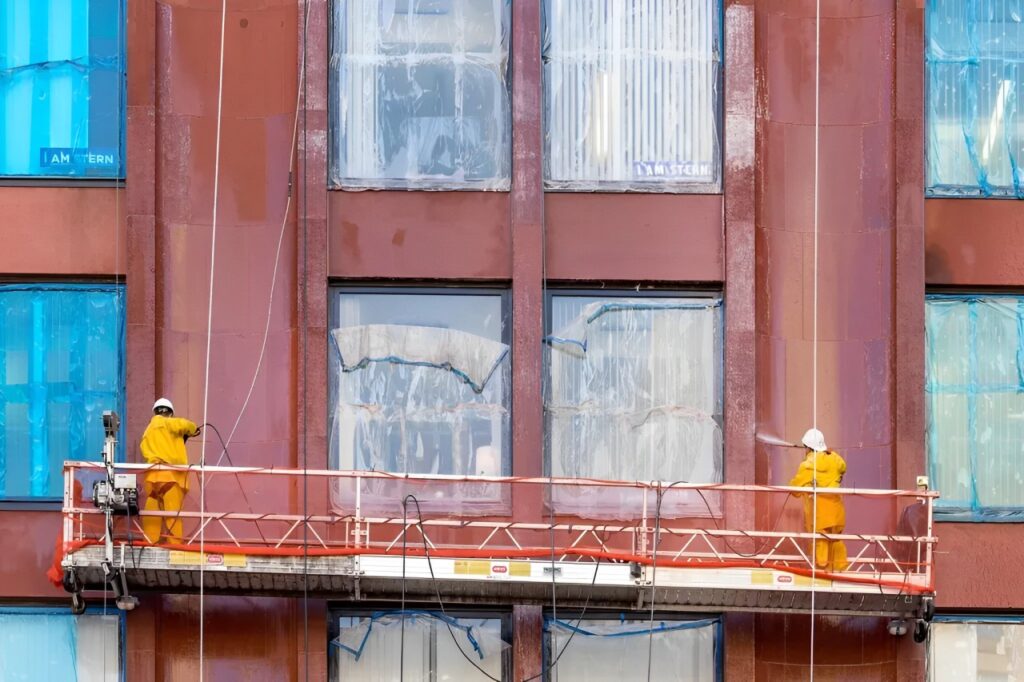 two men cleaning windows